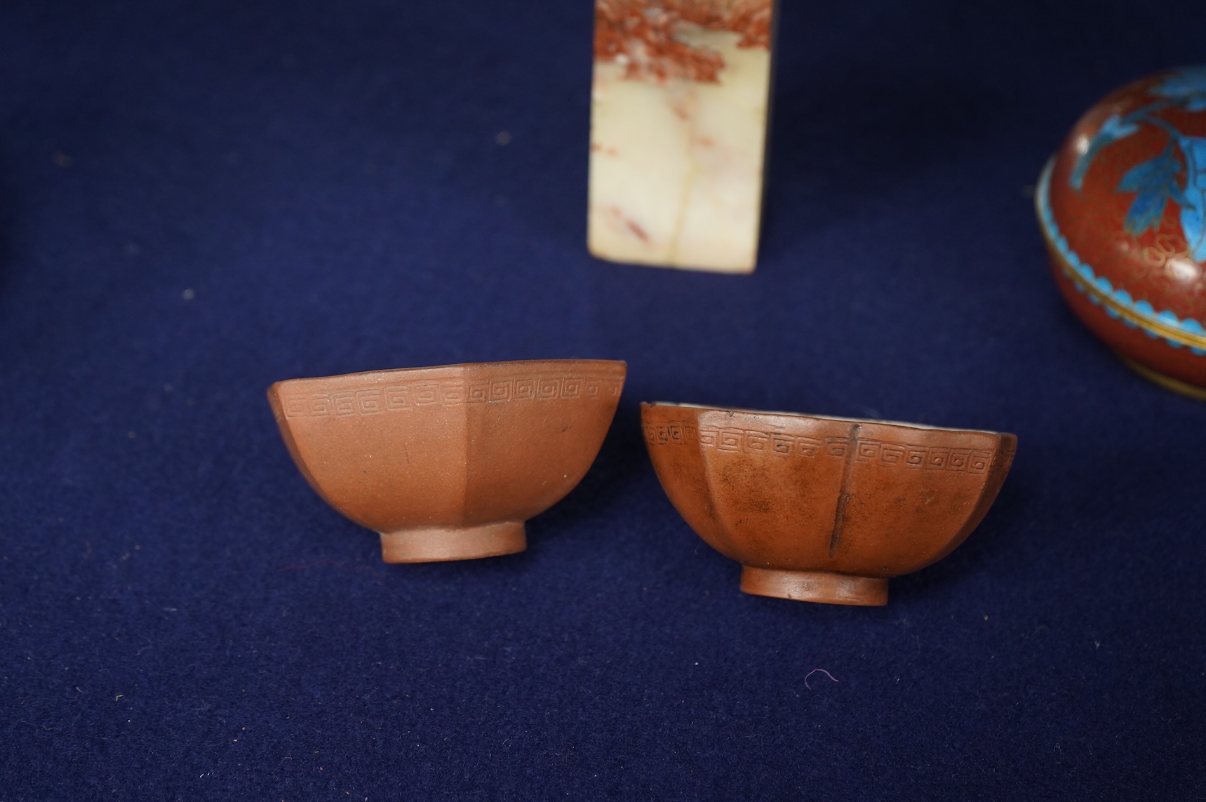 Two 18th century Yixing cups, a Chinese soapstone seal and two covered cloisonne pots, seal 11cm high